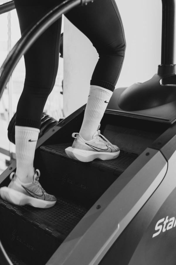 Feet on the steps of a StairMaster stair climber